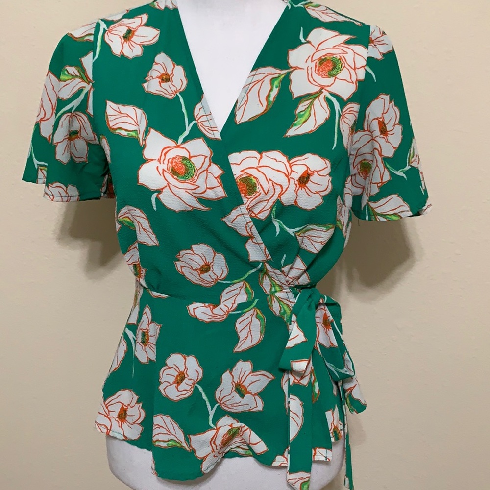 Wrap top with button inside and tie waist detail